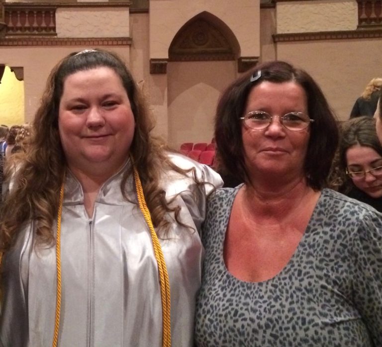 Candy at graduation with her mom Candy and her mother at graduation