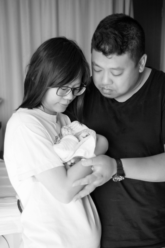 Wendy, Gary and Isaiah Couple with tiny baby